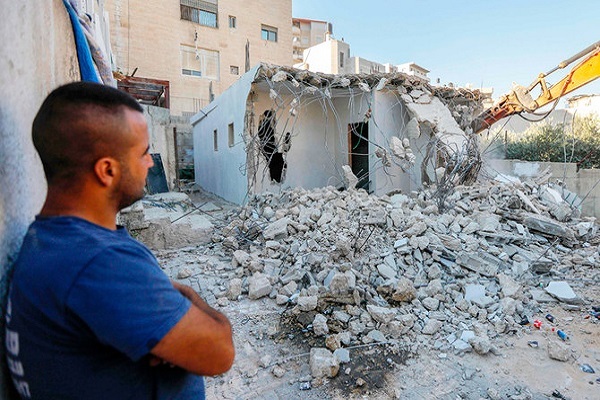Israeli regime forces demolishing Palestinian home