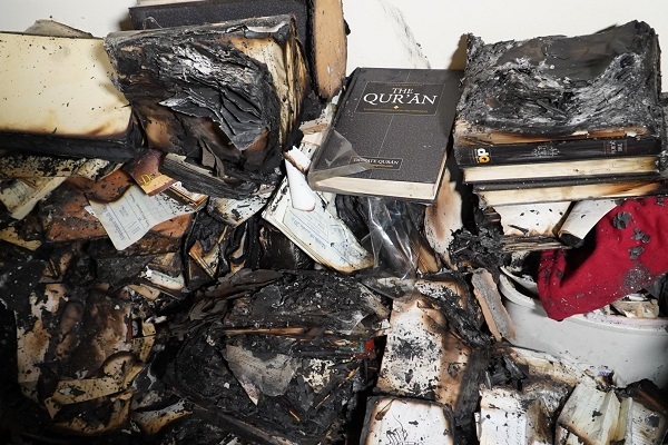 Several copies of the Quran were set ablaze at the Al-Falah Institute