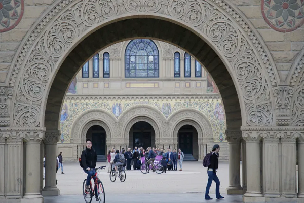 Students walk on campus at Stanford University.