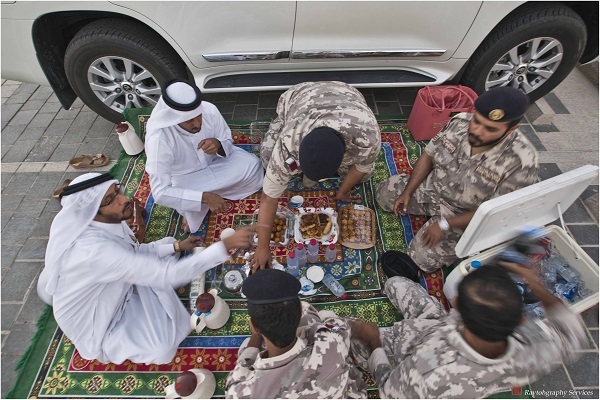 Qatari Muslims breaking their fast in Ramadan