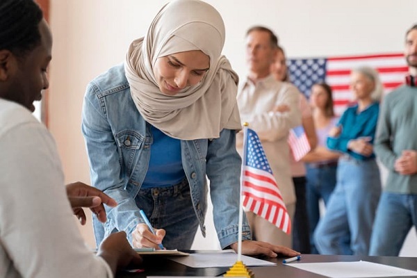 A Muslim woman voting in US elections
