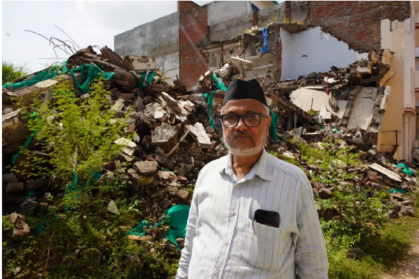 Muslim activist Javed Mohammed in Prayagraj city in India's Uttar Pradesh state outside his demolished house