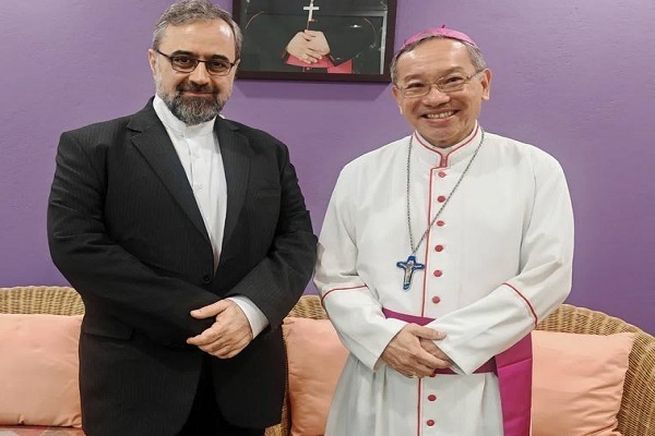 Iran’s Cultural Attaché in Malaysia Habib Reza Arzani met with Malaysian Bishop Simon Peter Poh Hoon Seng.