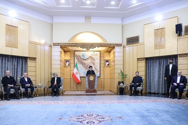 Iranian President Ebrahim Raeisi speaking to reporters ahead of visit to Algeria