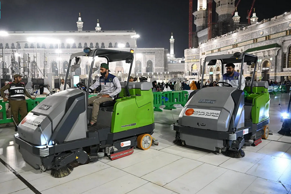 Sanitation workers cleaning Mecca Grand Mosque
