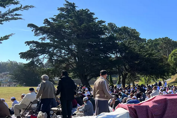 A man walking two dogs at San Francisco’s McLaren Park verbally attacked a Muslim group gathered in communal prayer Monday morning for the annual Eid al-Adha holiday.