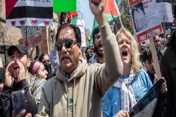 Pro-Palestinian protesters march through streets of New Haven in the US state of Connecticut