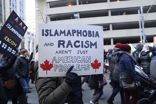 People protest racism, Islamophobia during a rally in Toronto, Canada, on February 4, 2017