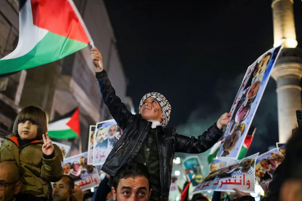 Palestinians celebrate victory against the Israeli regime