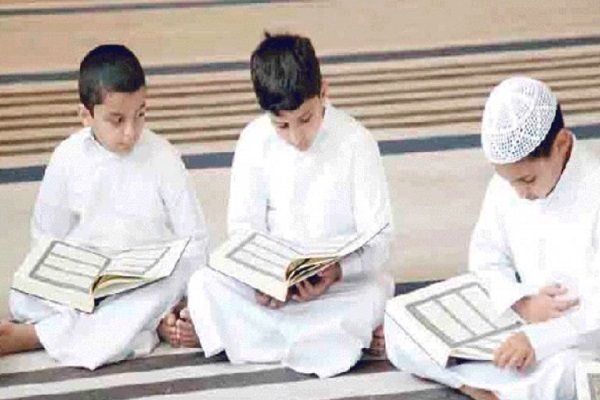 children learning Quran in Algeria