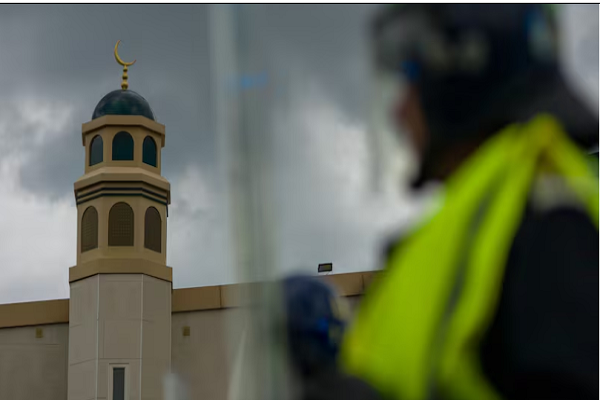 Police protecting a mosque in Sunderland during the riots of summer 2024.