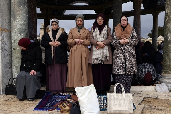 Women pray at the Al-Aqsa Mosque compound in Al-Quds Old City, Mar. 21, 2025. (AFP)