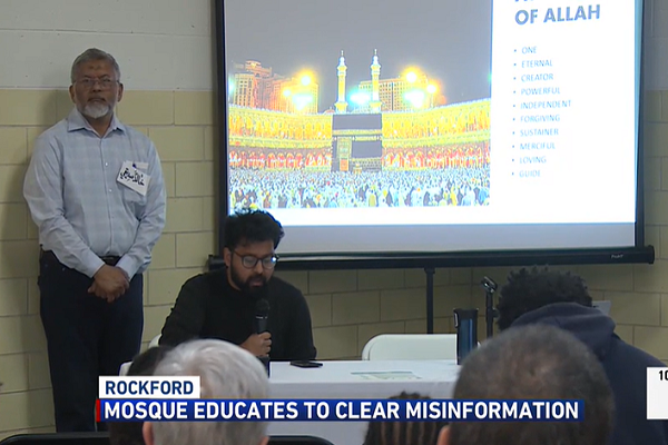 A member of the Rockford chapter of the Islamic Circle of North America (ICNA) explains about Islamic faith during an open mosque day (May 10, 2025)