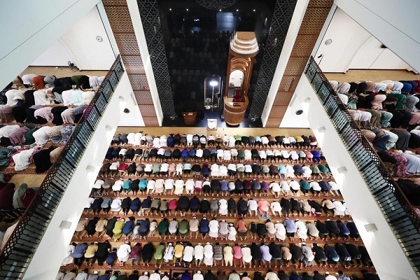 Muslims praying at a mosque in Singapore