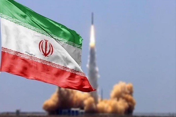 The flag of Iran and an Iranian missile fired in the background.