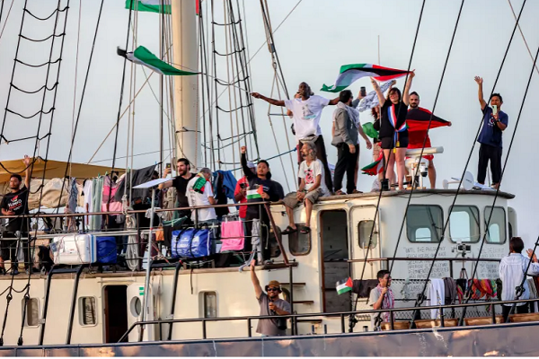 Activists and human rights defenders on board a vessel departing from Tunisia's northern port of Bizerte on September 14, 2025, as part of the Global Sumud Flotilla, bound for the Gaza Strip.