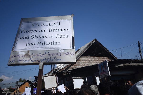 Kashmiri Muslims hold placards as they chant slogans against Israel and the U.S. during a protest against Israel's military operations in Gaza, on October 13, 2023, in Budgam, west of Srinagar, Indian-administered Kashmir, India. (Photo by Mubashir Hassan, IQNA)
