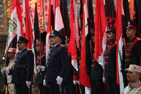 تصاویری از پرچم عزای حسینی بر فراز گنبد ائمه(ع) در عراق تصاویری از پرچم عزای حسینی بر فراز گنبد ائمه(ع) در عراق