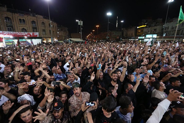 تصاویری از پرچم عزای حسینی بر فراز گنبد ائمه(ع) در عراق تصاویری از پرچم عزای حسینی بر فراز گنبد ائمه(ع) در عراق