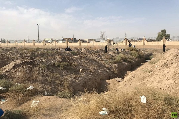 تصاویری از بزرگترین گور جمعی در شهر الرقه سوریه