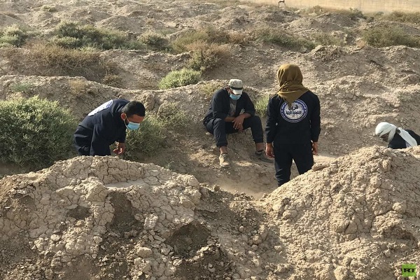 تصاویری از بزرگترین گور جمعی در شهر الرقه سوریه