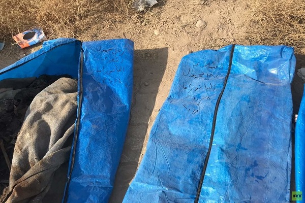 تصاویری از بزرگترین گور جمعی در شهر الرقه سوریه