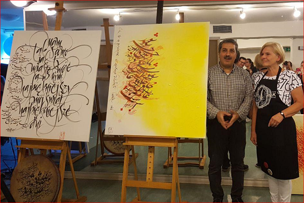 ایران؛ مهمان روز خوشنویسی لهستان با کتابت &laquo;یا حسین(ع)&raquo;/ خلق اثری عاشورایی + عکس و فیلم