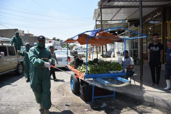 ضدعفونی خیابان های موصل توسط حشد الشعبی +عکس