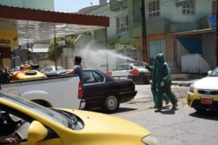 ضدعفونی خیابان های موصل توسط حشد الشعبی +عکس