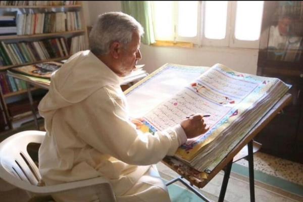 آرزوی خطاط لیبیایی برای کتابت قرآن کریم + عکس