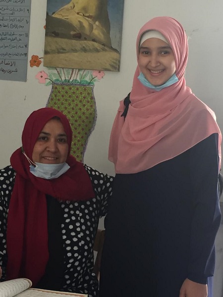 تجلیل از دانش&zwnj;آموز مصری که کل قرآن را کتابت کرده است + عکس