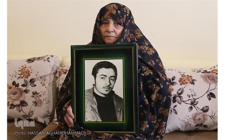 شهید &laquo;بهرام مساوات&raquo; و بدرقه از زیر قرآن برای آخرین بار + فیلم