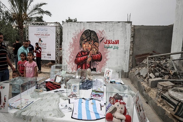 گرافیتی هنرمندان فلسطینی در ویرانه‌های جنگ غزه + عکس