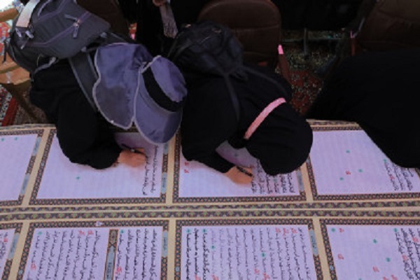 نگارش طولانیترین قرآن توسط عتبه حسینی + عکس نگارش طولانیترین قرآن توسط عتبه حسینی + عکس