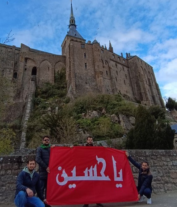 اهتزاز پرچم امام حسین(ع) در مجاورت کلیسای سن میشل فرانسه + فیلم