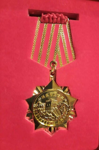 اعطای نشان دولت چین به پژوهشگر ایرانی اعطای نشان دولت چین به پژوهشگر ایرانی