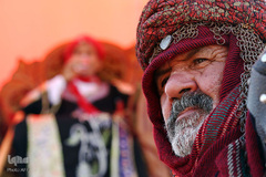 یک شیعه عراقی در تعزیه نبرد کربلا در شهر مقدس نجف