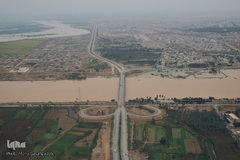 تصاویر هوایی از رودخانه کارون و منطقه سیل‌زده بامدژ