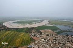 تصاویر هوایی از رودخانه کارون و منطقه سیل‌زده بامدژ