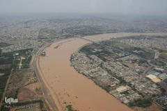 تصاویر هوایی از رودخانه کارون و منطقه سیل‌زده بامدژ