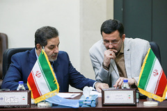 از راست کریم دولتی و هاشم روغنی ناظرین هیئت داوران از ایران