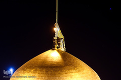 تعویض پرچم گنبد حرم امام رضا(ع)‎