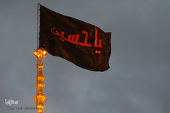 ⁨تعویض پرچم گنبد بارگاه حضرت معصومه(س)