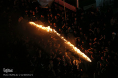 ⁨آیین مشعل گردانی نجفی‌های مقیم قم⁩