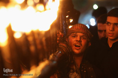 ⁨آیین مشعل گردانی نجفی‌های مقیم قم⁩