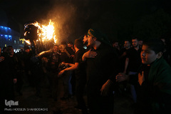 ⁨آیین مشعل گردانی نجفی‌های مقیم قم⁩