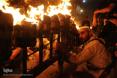 ⁨آیین مشعل گردانی نجفی‌های مقیم قم⁩