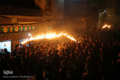 ⁨آیین مشعل گردانی نجفی‌های مقیم قم⁩