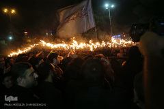 ⁨آیین مشعل گردانی نجفی‌های مقیم قم⁩