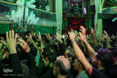 آیین سنتی نخل گردانی و عزاداری ظهر عاشورا در تکیه بزرگ تجریش